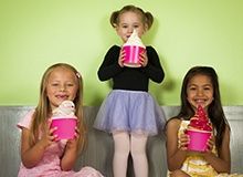 Photo of three girls with frozen yogurt