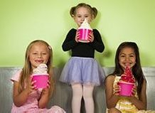 Photo of three girls with frozen yogurt