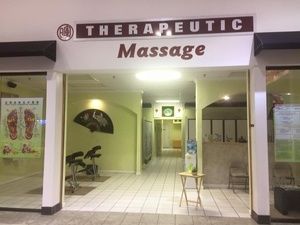 THERAPEUTIC MASSAGE logo