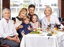 Phot of family dining together